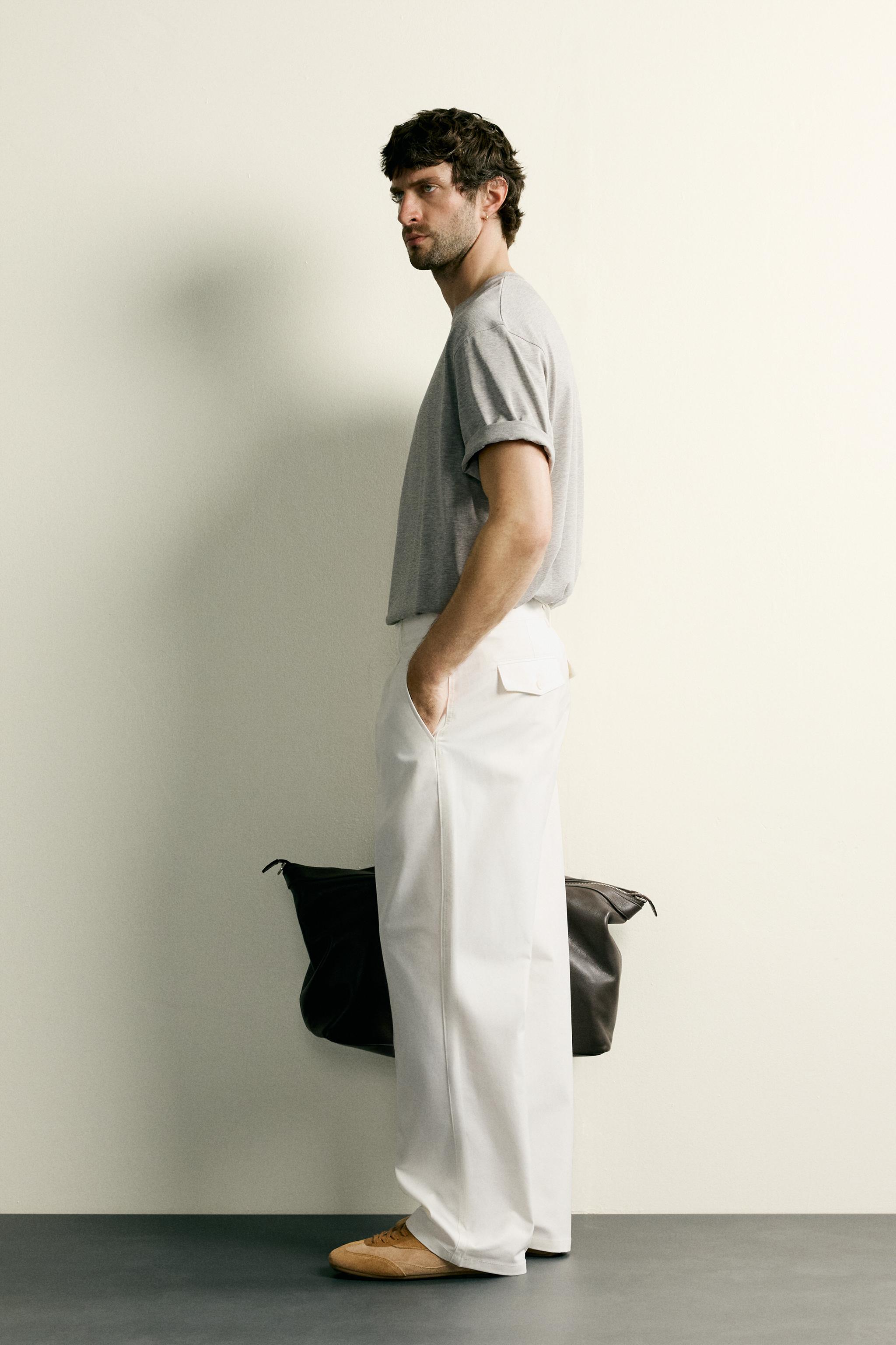 STRAIGHT FIT PLEATED PANTS